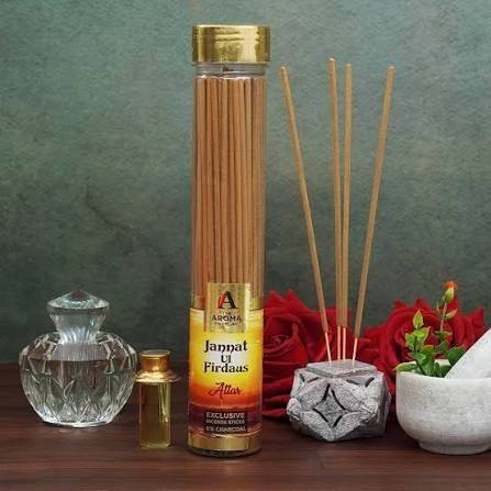 Incense sticks and attar perfume bottles