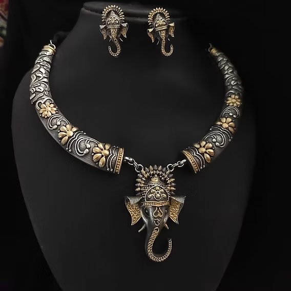 Oxidised silver necklace and earring set with Ganesha motif