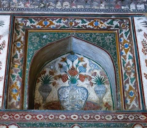 Pietra dura marble inlay archway with floral vase motifs