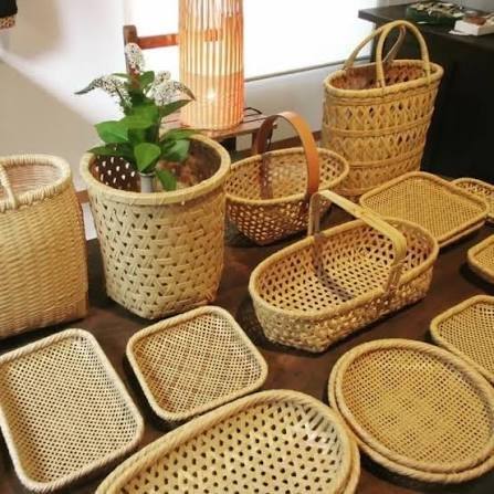 Assorted hand-woven bamboo baskets and trays