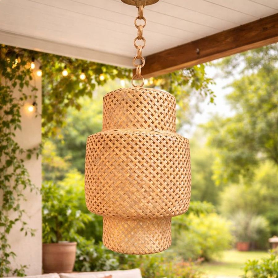 Tiered woven bamboo pendant lampshade hanging on a porch