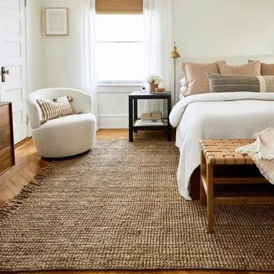 Natural jute floor rug in a bedroom