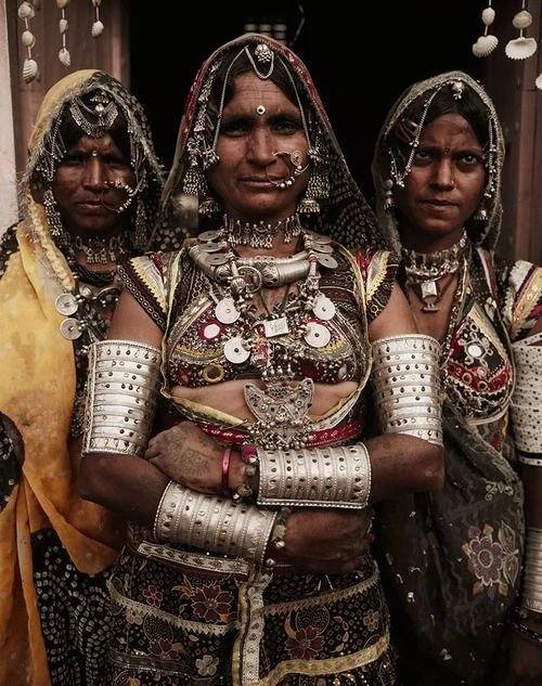 Rajasthani women wearing traditional tribal silver jewelry